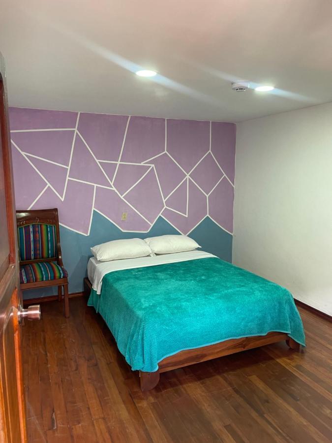 El Jardin Escondido Party Hostel บาญอส ภายนอก รูปภาพ
