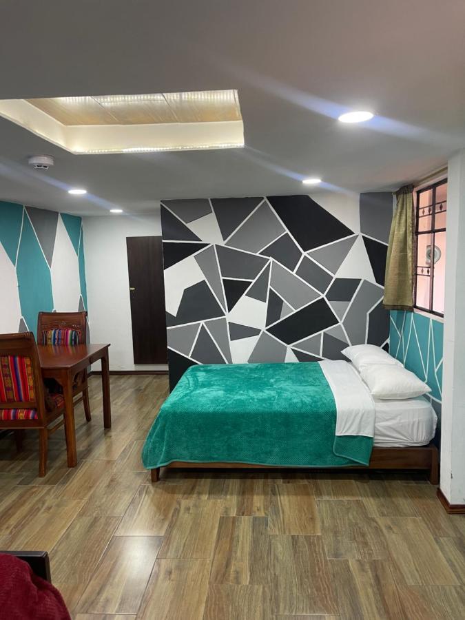 El Jardin Escondido Party Hostel บาญอส ภายนอก รูปภาพ