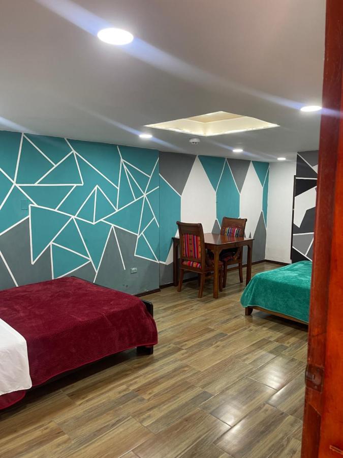 El Jardin Escondido Party Hostel บาญอส ภายนอก รูปภาพ