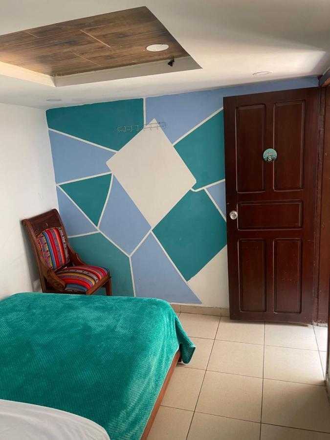 El Jardin Escondido Party Hostel บาญอส ภายนอก รูปภาพ