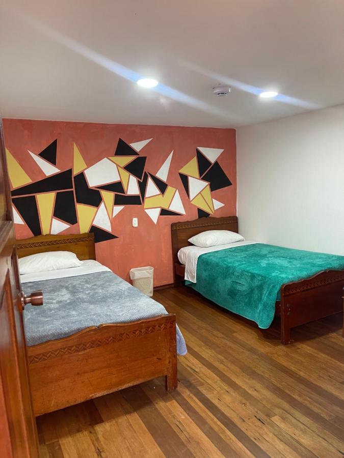 El Jardin Escondido Party Hostel บาญอส ภายนอก รูปภาพ