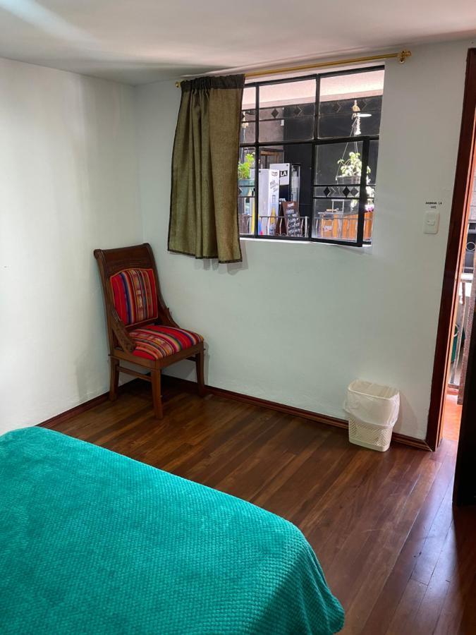 El Jardin Escondido Party Hostel บาญอส ภายนอก รูปภาพ