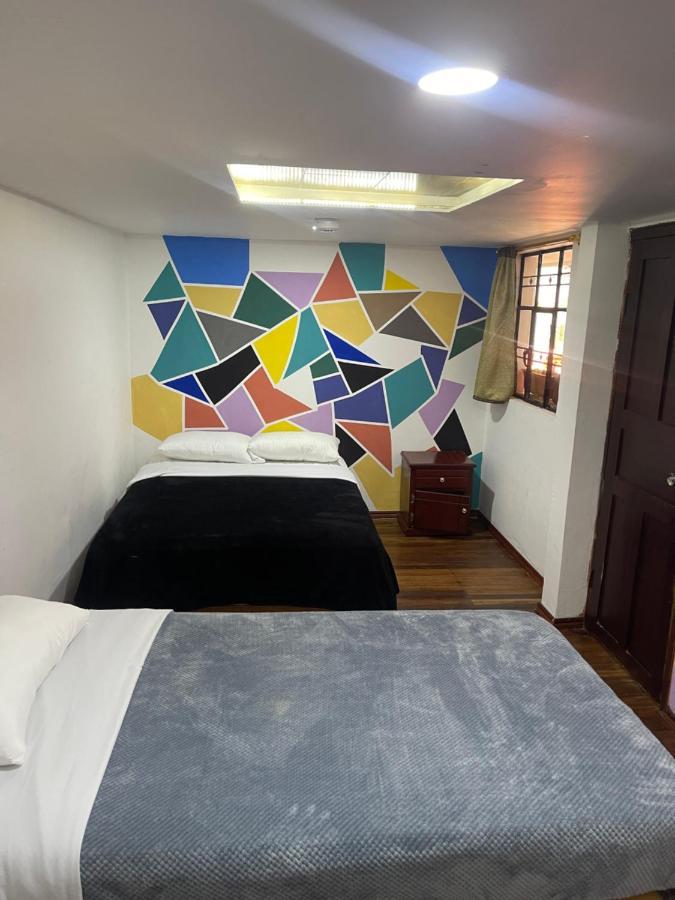 El Jardin Escondido Party Hostel บาญอส ภายนอก รูปภาพ