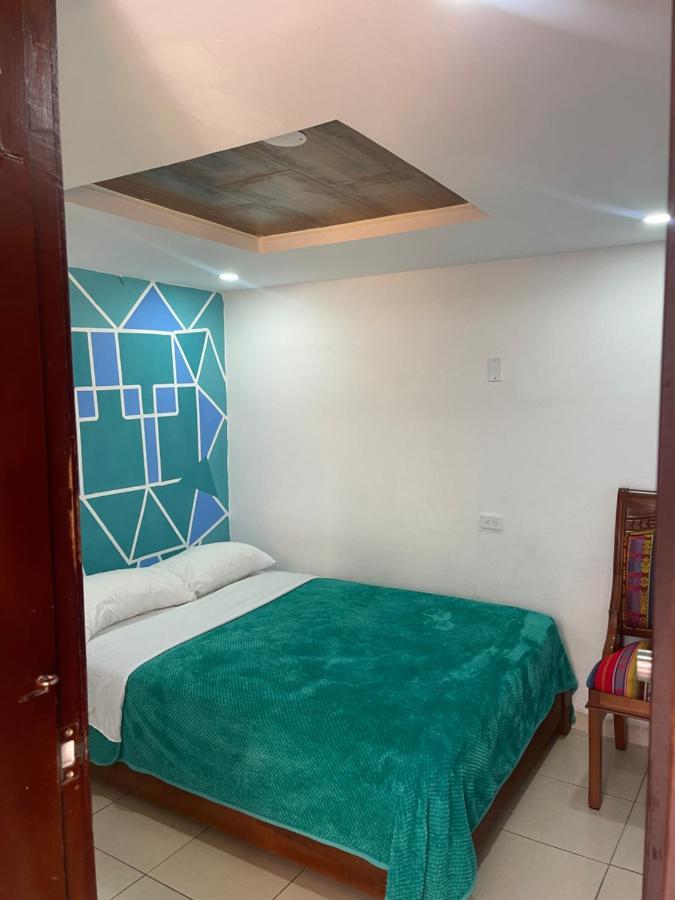 El Jardin Escondido Party Hostel บาญอส ภายนอก รูปภาพ