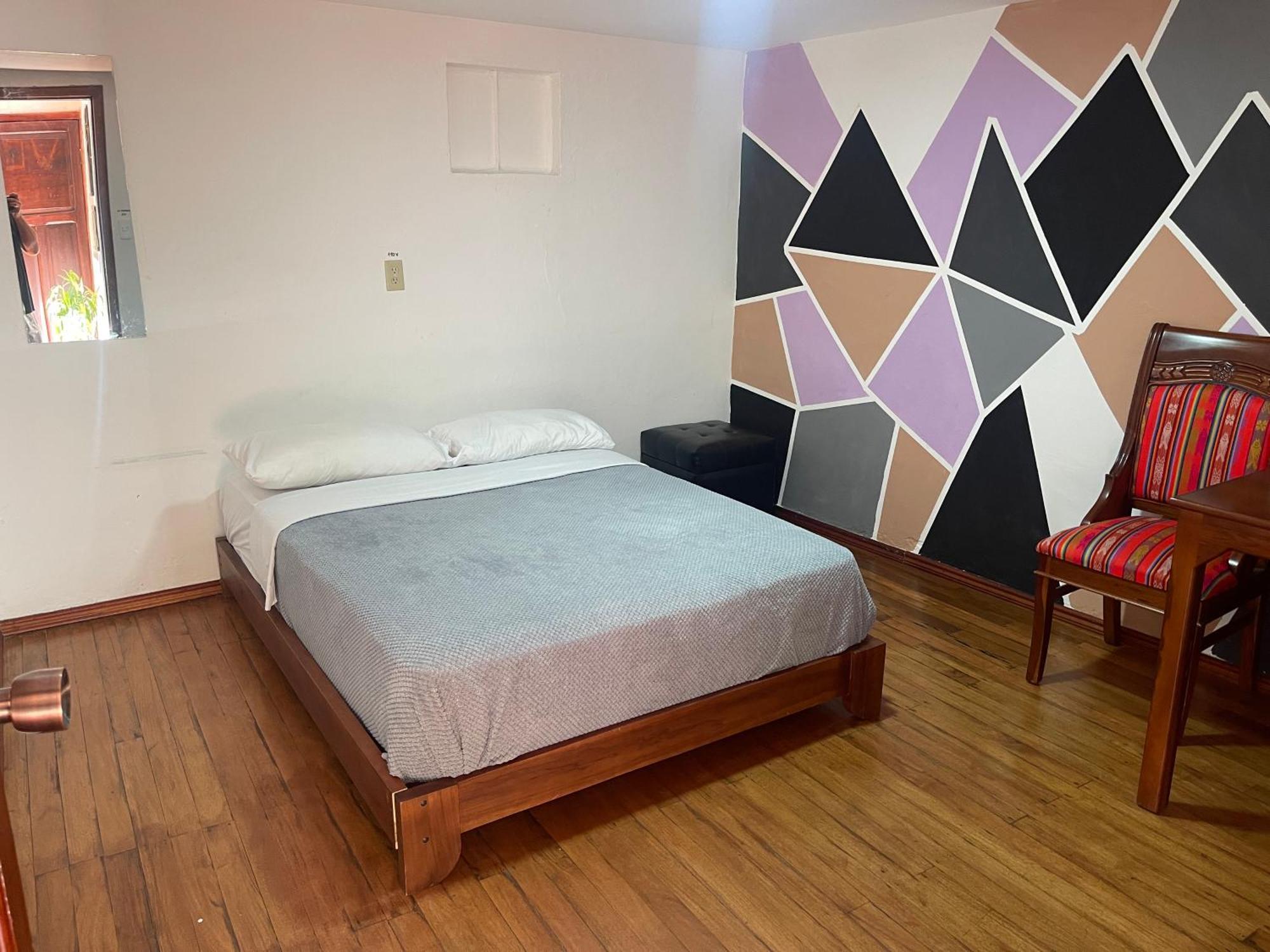 El Jardin Escondido Party Hostel บาญอส ภายนอก รูปภาพ