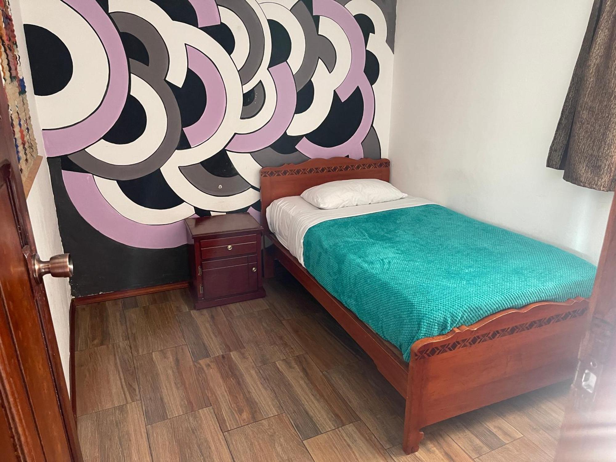 El Jardin Escondido Party Hostel บาญอส ภายนอก รูปภาพ